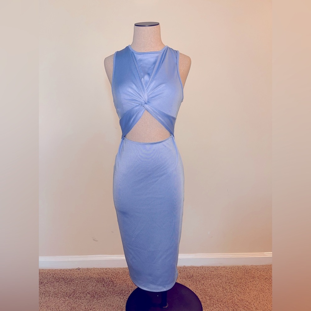 Cute find. Cinderella Blue dress with front cut out to show and create curves.